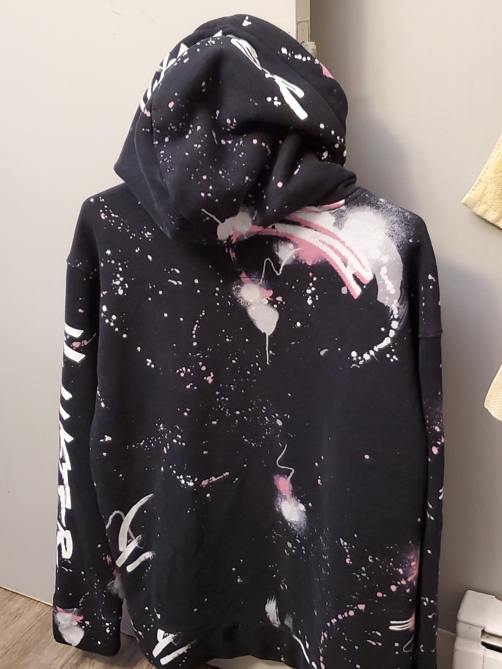Men's Black Paint-Splatter Hoodie with Pink and White Accents